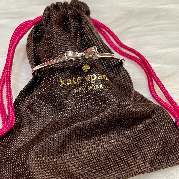 KATE ♠️ SPADE SILVER BOW PUSH BUTTON BANGLE NWOT - Picture 5 of 11